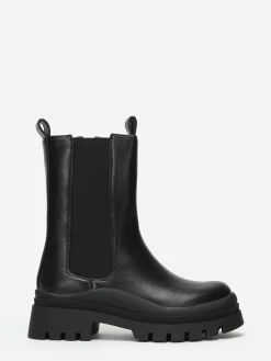 La Modeuse Bottines chelsea en simili crantées Noir