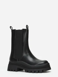 La Modeuse Bottines chelsea en simili crantées Noir