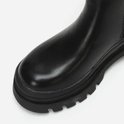 La Modeuse Bottines chelsea en simili crantées Noir
