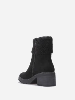 Hot La Modeuse Bottines crantées et fourrées Noir