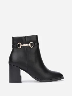 Hot La Modeuse Bottines en simili à mors doré Noir