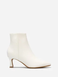 La Modeuse Bottines en simili à petit talon Blanc
