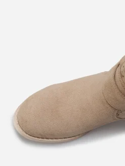 La Modeuse Bottines en suédine à sangles Taupe