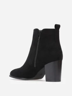 La Modeuse Bottines en suédine à zip décoratif Noir