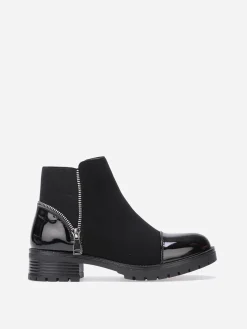 Hot La Modeuse Bottines multi-matières à zip décoratif Noir