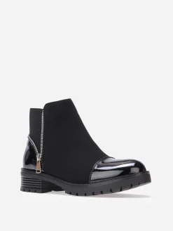 Hot La Modeuse Bottines multi-matières à zip décoratif Noir