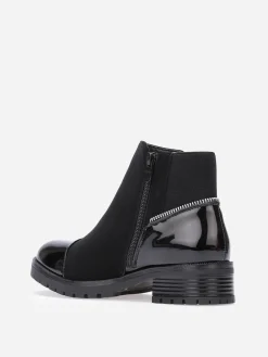 Hot La Modeuse Bottines multi-matières à zip décoratif Noir