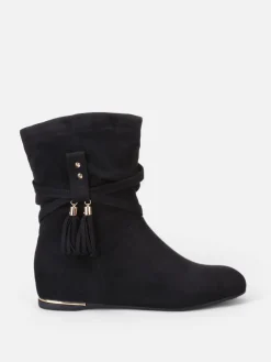 La Modeuse Bottines plissées et compensées à pampilles Noir