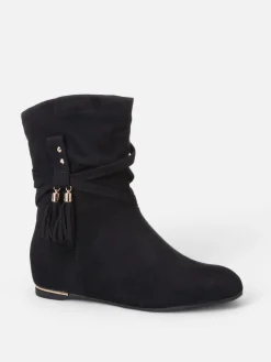 La Modeuse Bottines plissées et compensées à pampilles Noir