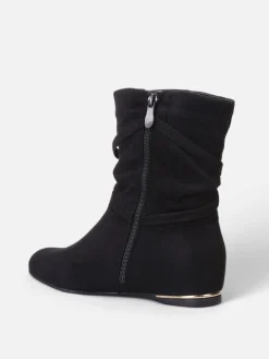 La Modeuse Bottines plissées et compensées à pampilles Noir