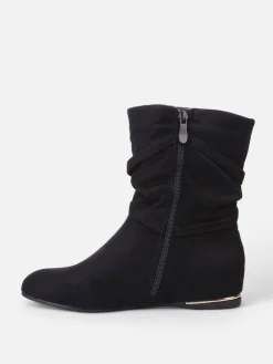 La Modeuse Bottines plissées et compensées à pampilles Noir