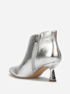 Outlet La Modeuse Bottines pointues à petit talon métallique Argenté