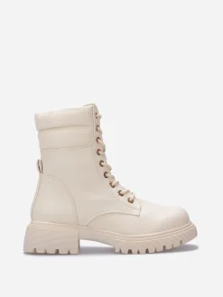 La Modeuse Bottines rangers à détail matelassé Beige