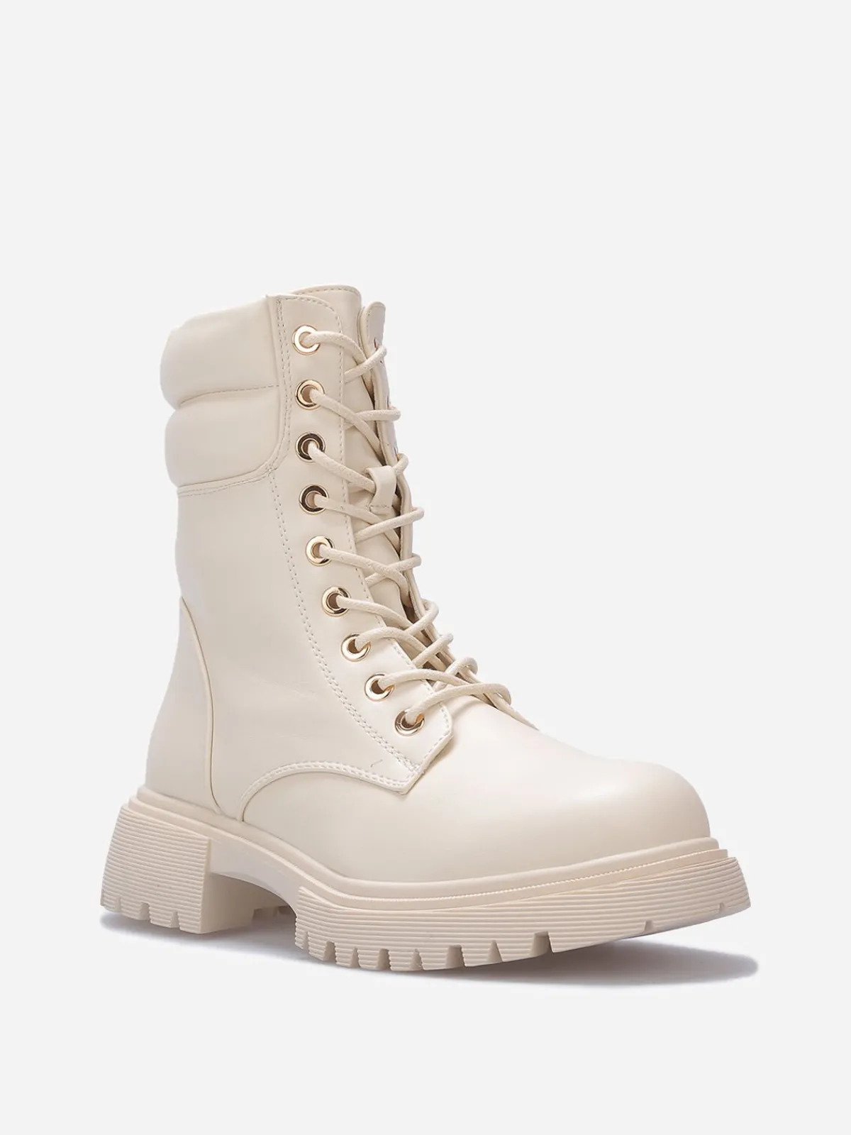 La Modeuse Bottines rangers à détail matelassé Beige
