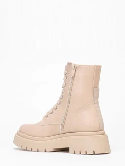 La Modeuse Bottines rangers à plateforme crantée Beige