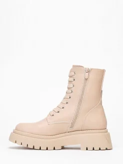 La Modeuse Bottines rangers à plateforme crantée Beige