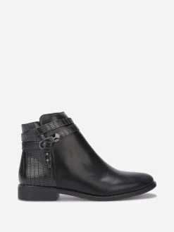 Sale La Modeuse Bottines texturées avec bride à boucle Noir