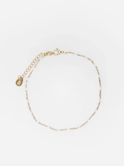 La Modeuse Chaine de cheville à perles Blanc