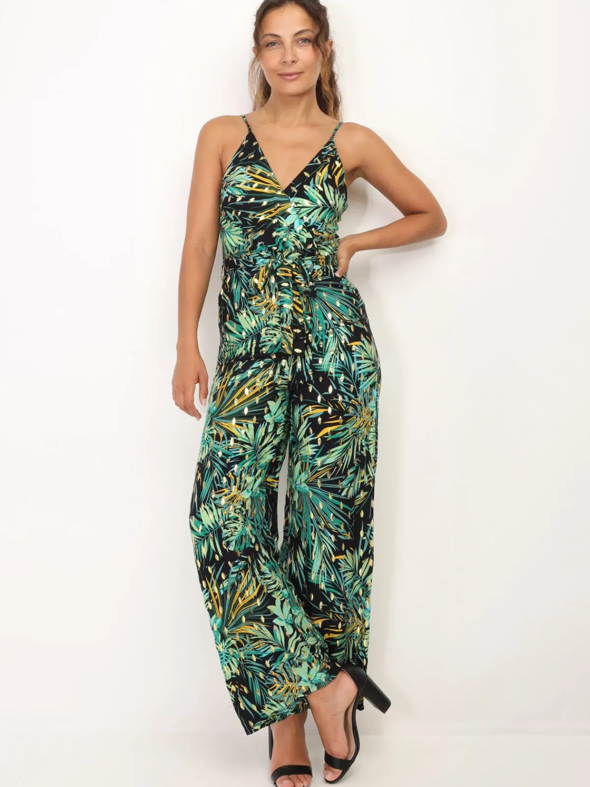 Hot La Modeuse Combinaison à motif tropical et détails dorés Noir