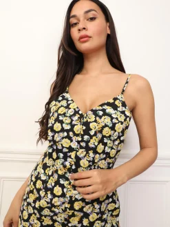 La Modeuse Combinaison boutonnée à fleurs Noir