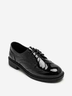 New La Modeuse Derbies vernies à détails ajourés Noir