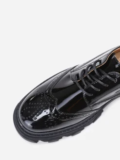 La Modeuse Derbies vernies et crantées Noir