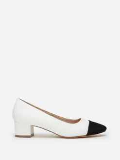 Sale La Modeuse Escarpins bicolores s avec bout noir en tissu Blanc