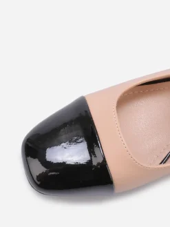 La Modeuse Escarpins bi-matières à détail perle Nude