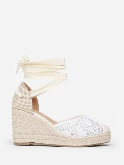 La Modeuse Espadrilles compensées  dentelées à nouer Blanc