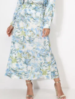 La Modeuse Jupe à motifs et éclats dorés Bleu