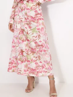 Sale La Modeuse Jupe à motifs et éclats dorés Rose