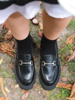 Sale La Modeuse Mocassins à semelle crantée et mors doré Noir