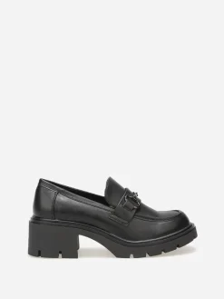 New La Modeuse Mocassins à talon et semelle crantés Noir