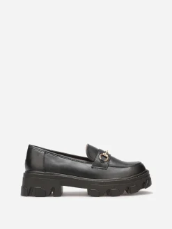 Sale La Modeuse Mocassins crantés avec bride dorée Noir