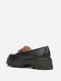 Sale La Modeuse Mocassins crantés avec bride dorée Noir