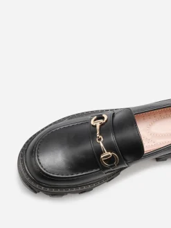 Sale La Modeuse Mocassins crantés avec bride dorée Noir