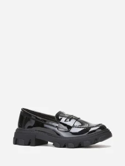 La Modeuse mocassins crantés en simili verni Noir