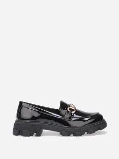 La Modeuse Mocassins vernis crantés à mors doré Noir