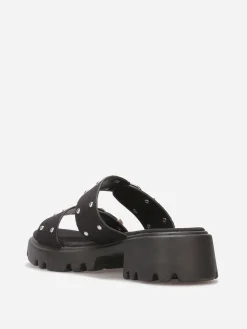 Sale La Modeuse Mules à boucles et clous argentés Noir