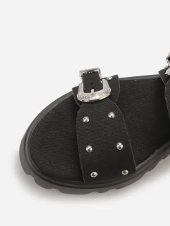 Sale La Modeuse Mules à boucles et clous argentés Noir