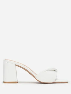 Online La Modeuse Mules à bride en simili matelassé Blanc