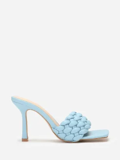 La Modeuse Mules à bride matelassée et tressée BleuClair