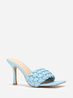 La Modeuse Mules à bride matelassée et tressée BleuClair