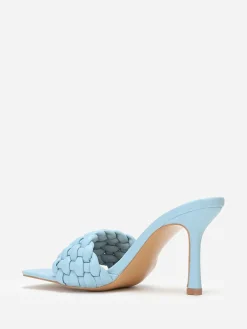 La Modeuse Mules à bride matelassée et tressée BleuClair