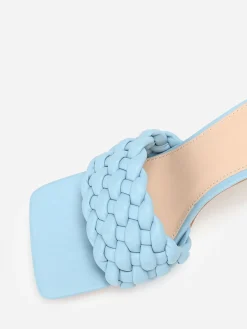 La Modeuse Mules à bride matelassée et tressée BleuClair