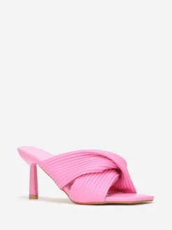 New La Modeuse Mules à brides croisées et matelassées Fuchsia