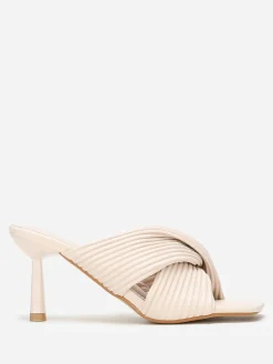 Online La Modeuse Mules à brides croisées et matelassées Beige