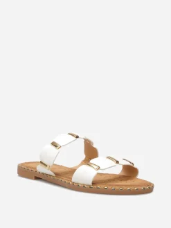 Sale La Modeuse Mules à brides festonnées et détails dorés Blanc