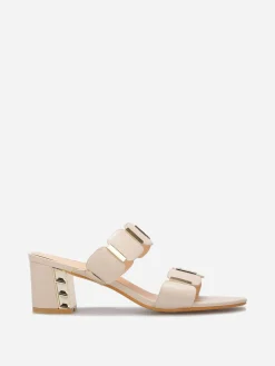 Sale La Modeuse Mules à double brides et détails dorés Beige