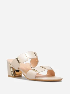 Sale La Modeuse Mules à double brides et détails dorés Beige